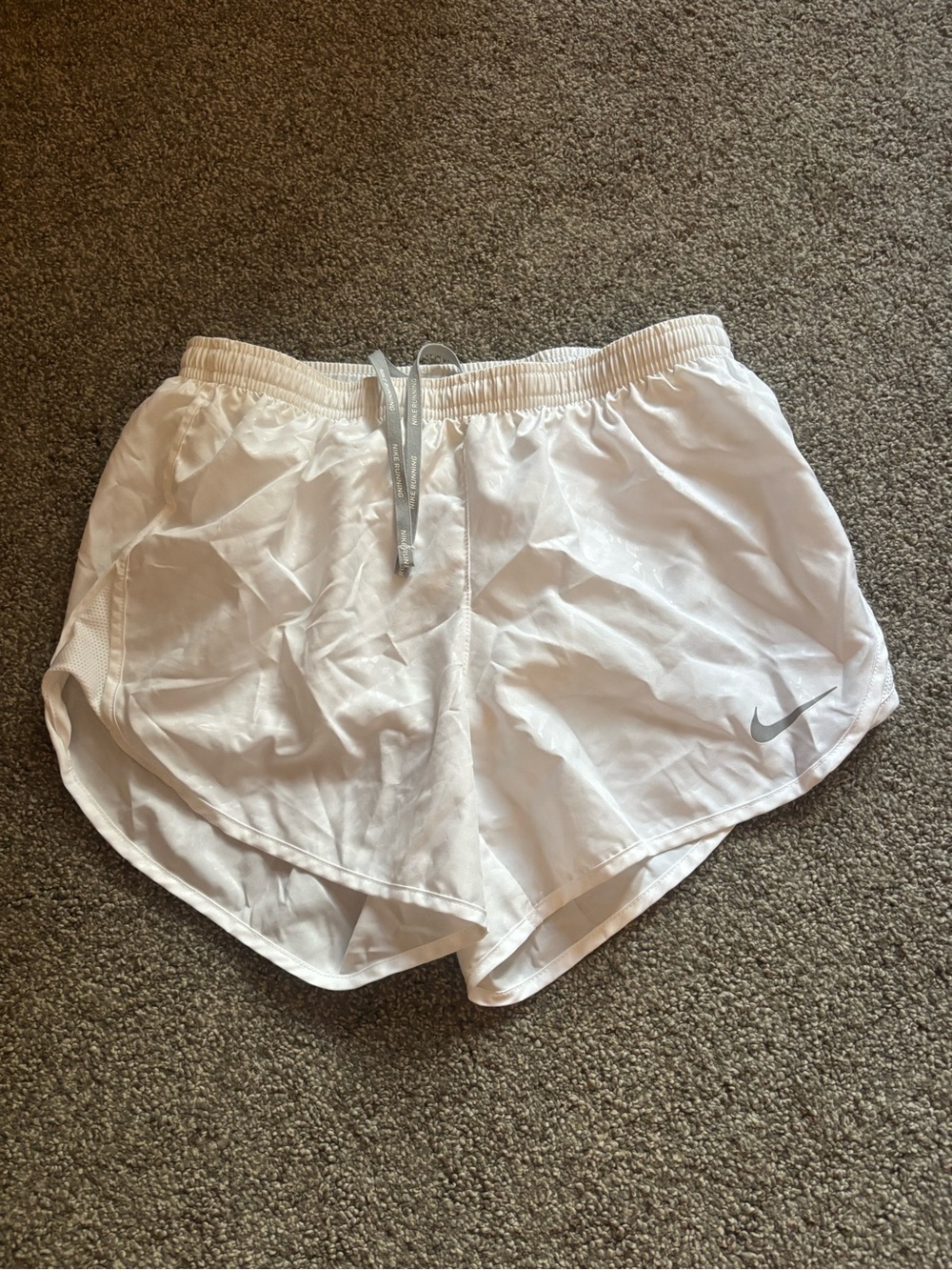 Nike Women's White Athletic Running Shorts with Silver Swoosh